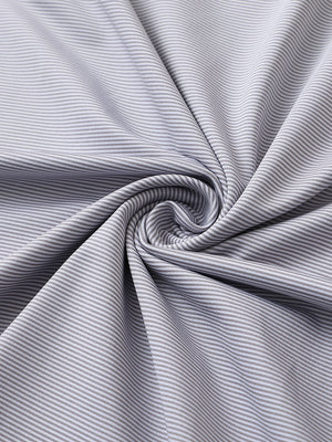 Fabric close-up of pinstripe jersey performance polo, fine stripe pattern with breathable grey white stripe finish
