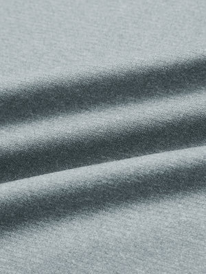 Close-up of classic heather pullover hoodies with 2 pocket fabric in lunar rock melange, soft knit texture