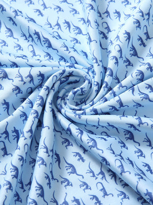 Fabric close-up of Everyday performance print polo with lightweight texture in blue dinosaur