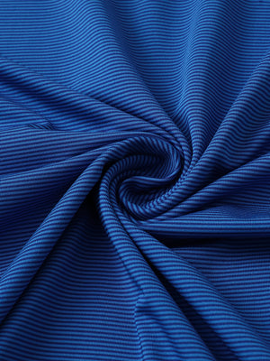 Fabric close-up of pinstripe jersey performance polo, fine stripe pattern with breathable cobalt stripe finish