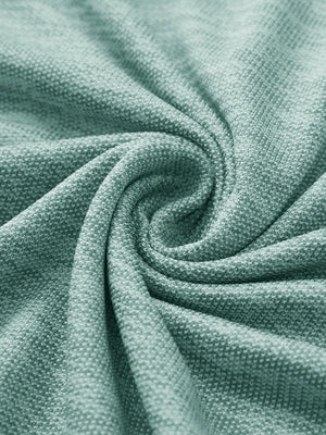 Fabric close-up of Premium Stretch Heather Polo showing crisp stripes and green heather detail