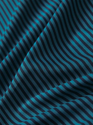 Fabric detail of Classic stripe polo shirts with crisp lines and smooth turquoise stripe finish