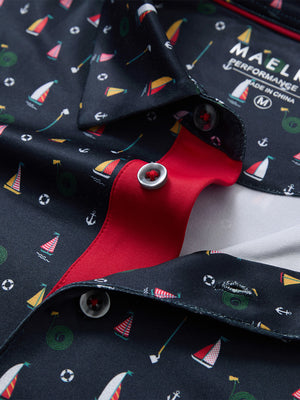 Detail shot of the collar on the colorful sailboat 4 way stretch print collared polo shirt, emphasizing the classic neckline design