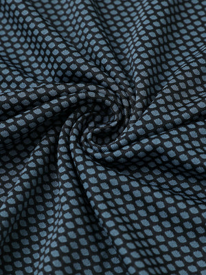 Close-up of black blue your favorite jacquard polo fabric showing textured knit and soft finish.