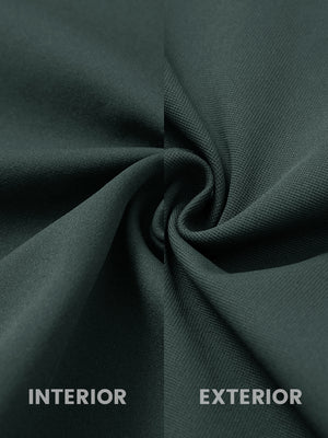 Close-up of fabric on water-resistant zip up golf jacket, showing texture and finish in dark green.