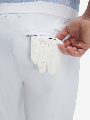 Detail view of back pocket on white flat front golf joggers pants with belt loops