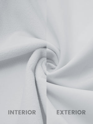 Close-up of light grey softshell jacket showing water resistant outer shell and smooth inner lining.