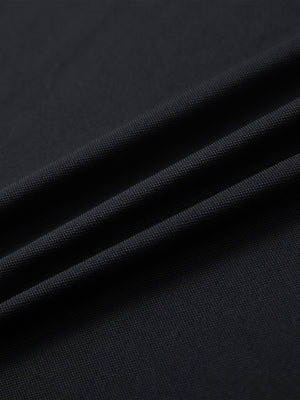 Fabric detail of Long sleeve performance solid pique polo with breathable knit in black