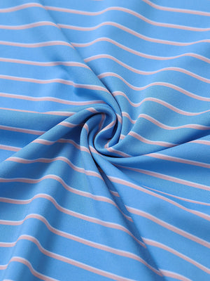 Close-up fabric view of youth performance golf polos, smooth texture with breathable sky blue/pink stripe finish
