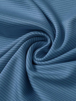 Close-up of dark blue melange pinstripe quarter zip pullover fabric showing fine lines and soft knit texture.