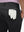 Detail view of back pocket on black breathable casual slacks with 4 pockets