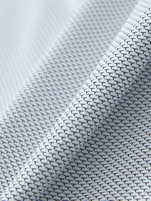 Close-up of the textured jacquard fabric on the navy feather weight jacquard polo shirts