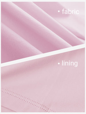 Close-up texture of light pink women's moisture-wicking athletic tennis skirts fabric showing detailed outer and inner lining material.
