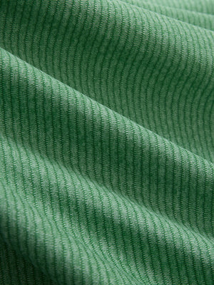 Close-up of light green ultra-light quick dry moisture wicking collared polo shirt fabric texture