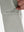 Detail view of design on silver gray flat front golf joggers pants with belt loops