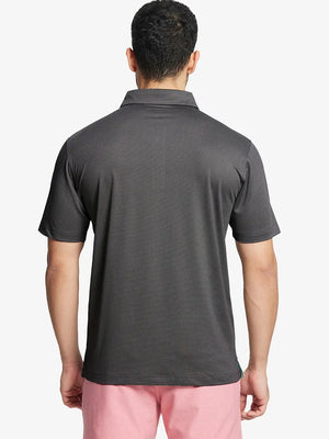 Rear half-body shot showing fit of BLACK Performance Ananas Jacquard Polo