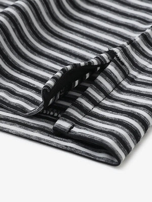Close-up detail of hem opening on Sport Fit Stripe Polo in Black Stripe