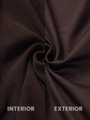 Inside and outer fabric close-up of coffee brown lightweight water resistant puffer vest, quilted shell with soft lining.