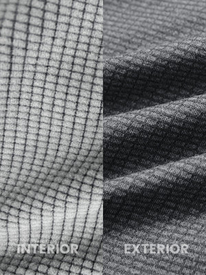 Close-up of melange fabric on warm fleece golf hoodies pullover, showing texture and detail in grey melange.