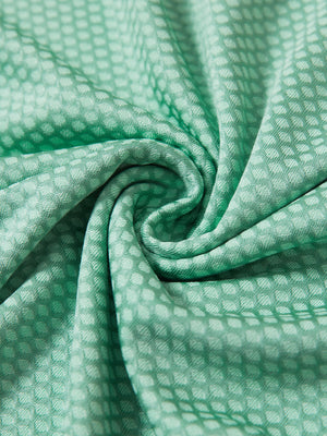 Jacquard quarter zip pullover, close-up fabric detail in light green showing textured knit pattern and soft feel