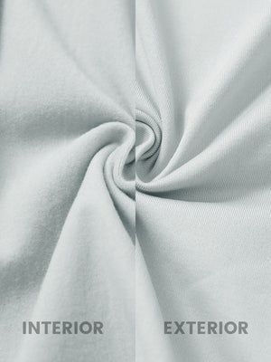 Inside and outer fabric close-up of light grey heather lightweight water resistant puffer vest, quilted shell with soft lining.