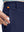 Detail shot of the side pocket on the dark blue youth water resistant cotton blend golf pants, showing functionality