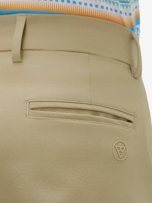 Close-up of the back pocket detail on the khaki youth water resistant cotton blend golf pants, emphasizing storage