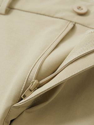 Detail view of the zipper on the khaki youth water resistant cotton blend golf pants, highlighting secure closure