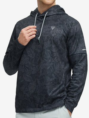 Front upper body of model wearing trendy print fleece hoodies, relaxed fit in black grey leaf