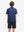 Back upper view of Stylish print boys polo shirts with clean lines and navy colorful flower tone