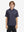 Front half-body shot of youth in navy pink seagull performance print boys golf polo, highlighting design and fit