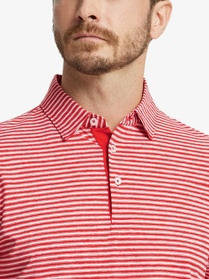 Front close-up shot of model from nose to chest wearing Sport Fit Stripe Polo in Red Stripe